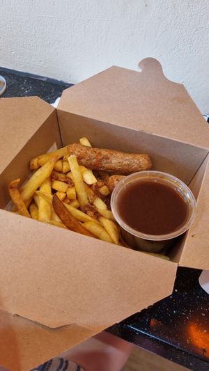 Vegan sausage, chips & gravy at Vegan Sting in Manchester