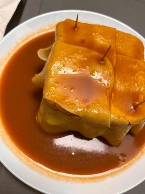 The famous francesinha!! at Lupin Snack Bar in Porto