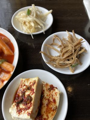 Burdock, bellflower root, and tofu. Complimentary side dishes. Owner brought out only the vegan ones.   at Gangnam Style Korean Kitchen in Syracuse