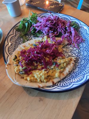 Coronation chickpea with pickled red cabbage with whole grain flatbread at The Magic Sunflower in Dronfield
