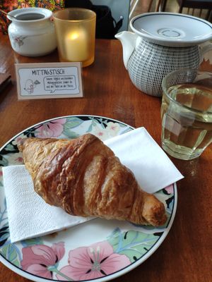 Croissant with Sencha at Café Rotkehlchen - Merowingerstraße in Cologne