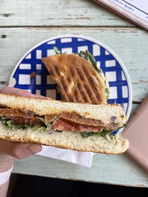 Panini seitan cashew cheese dried tomatoes salad   at Café Rotkehlchen - Merowingerstraße in Cologne