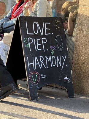 sign  at Café Rotkehlchen - Merowingerstraße in Cologne
