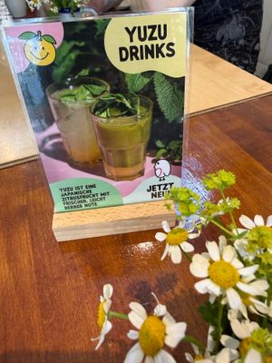 sign at Café Rotkehlchen - Merowingerstraße in Cologne