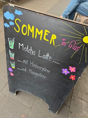 sign at Café Rotkehlchen - Merowingerstraße in Cologne