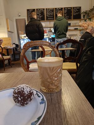 A cinnamon latte and a chokladbullar at Cafe Krans in Stockholm