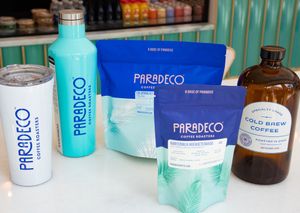 An image of our coffee and coffee bags, as well as other merch. at Paradeco Coffee Roasters in St Petersburg