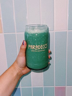 Paradise Smoothie! Dates, Lemon, Pineapple, Spirulina. Made with coconut milk. Sub oat and almond if you'd like.  at Paradeco Coffee Roasters in St Petersburg