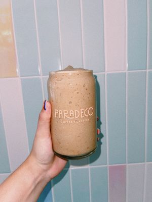Coco Coffee, banana, coffee and cacao nibs. Made with coconut milk. Sub oat and almond if you'd like.  at Paradeco Coffee Roasters in St Petersburg
