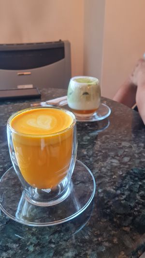 Golden Berry drink and matcha orange cream drinks at Biofilia - Botánica Coffee House in La Paz