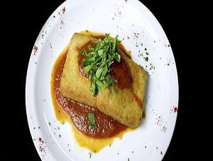 Polenta frita en colchon de fileto y albahaca at Almacen Purista in Buenos Aires
