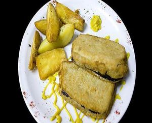 Milanesa de berenjena rellena con papas maceradas en hierbas y aceite at Almacen Purista in Buenos Aires