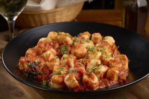 Gnocchi Pompei.
Homemade gnocchi in signature tomato sauce (tomatoes, garlic, salt, pepper, olive oil) and parsley. at Piola in Hallandale Beach