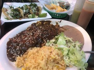 Mole Poblano special & assorted tacos! at Quesadilla La Reina Del Sur in Chicago