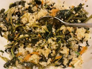 My style bibimbap. Put rice & all mountain leaves in the bowl, add little bit of soy sauce, little bit of gochujang, 2 spoons of denjangjjigae, 1 spoon of sesame or perilla oil.  at Eden in Seoul