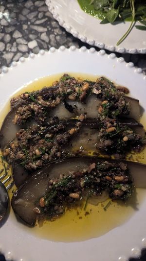 Eggplant in olive oil w/beccafico dressing of pine nuts + citrus $25.00: ok at Patsy's in Melbourne