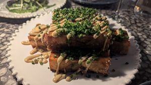 Potato gratin $18.00 for 3 pieces: DELISH, crispy layers, delish herb sauce at Patsy's in Melbourne