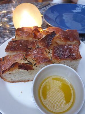 Focaccia w/confit garlic $9.00:  really refreshing and tasty lemon? infused olive oil at Patsy's in Melbourne