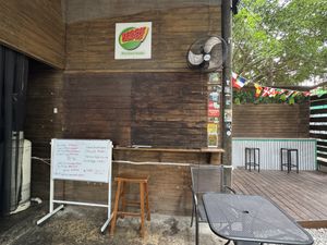 Menu and the restaurant frontal  at Veggie Campus in Kingston