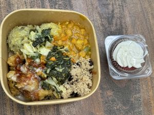Black bean quinoa, mashed sweet potato, cauliflower bites, stir fry veggies & my fav velvet cupcake 🧁😃  at Veggie Campus in Kingston