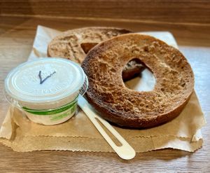 Pumpernickel bagel with vegan cream cheese   at Flying Goat Coffee in Healdsburg