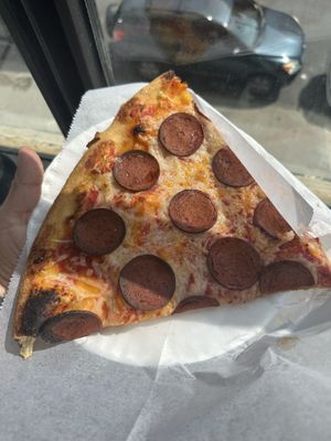 Vegan pepperoni slice  at Sauce & Soda in Brooklyn
