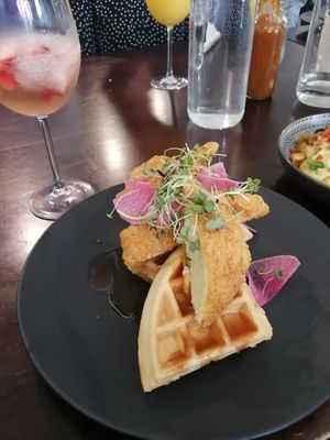 Brunch Special: Vegan Chicken & Waffles with a Frose to drink at Stillfood Bistro in Salmon Arm