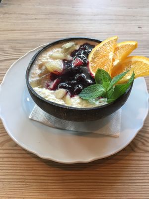 Millet on coconut milk with apple and plum (warm breakfast)  at Cały Gaweł Cantine Bar Cafe in Sopot