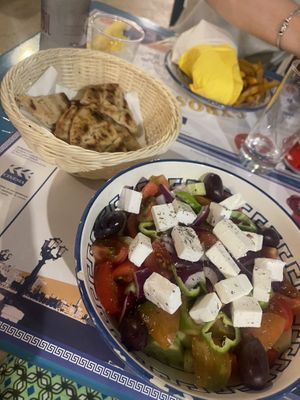 Greek salad with vegan feta and a side of pita  at Gyrosteria Yannis - Borgo Antico  in Bari