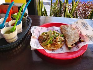 Taco rarito (left) and the C. Flor de Jamaica(right), which is a quesadilla at Coapenitos in Cancun