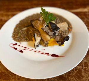 Lenticchie in umido con purè di patate alla zucca e funghi cardoncelli cotti in * CBT  at Hosteria della Pignatta in Binasco