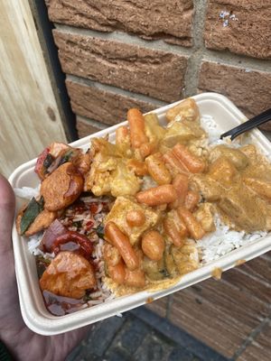 Mix of yellow Thai curries and rice and ‘chicken’ curry   at Vegan Thai Food - Food Stall in North West London