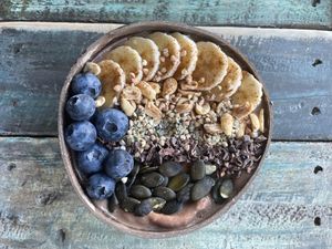Peanut Butter Snickers Bowl at Earth to Body Cafe in Croydon
