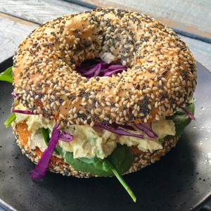 The 'Eggy Everything' bagel made with tofu & cashew egg salad at Earth to Body Cafe in Croydon