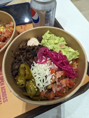 Build your own bowl with vegan cheese and Impossible meat at Taqado - Dubai Mall in Dubai