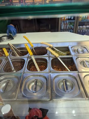 Vegan items include beans, rice, impossible meat at Taqado - Dubai Mall in Dubai