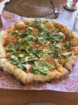 Pizza with Heirloom Tomatoes - nut based vegan cheese was some of the best we’ve had!  at BIO at Xcaret Mexico in Playa Del Carmen