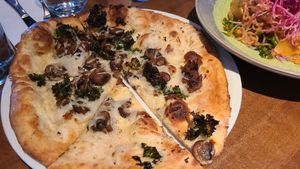I think this is the most delicious vegan pizza in the city. It is rich in mushroom n onion taste. Tasted like they have put the can of creamy mushroom concentrate inside.  at Earls Kitchen + Bar - South Common in Edmonton