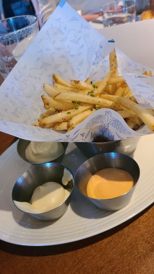 I asked them to give me vegan mayo instead. They did and made one mixed with Sriracha.  at Earls Kitchen + Bar - South Common in Edmonton