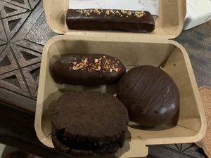 Orange cashew choc, Butter Finger Matcha, cashew butter choc cookie and homemade choco pie. My faves were the Choco pie and the cashew butter choc cookie    at Vegan Bakery By Heart in Phuket
