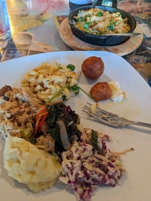 Southern bbq plate split in half with some Mac n cheez at Fiction Kitchen in Raleigh