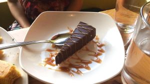 Chocolate Ganache Cheesecake with Salted Caramel drizzle at Fiction Kitchen in Raleigh
