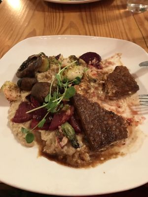Seitan and grits. Veggies were mushrooms, brussel sprouts and beets. So incredibly delicious!! at Fiction Kitchen in Raleigh