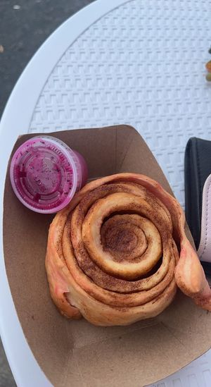 Cinnamon roll with pink pitaya frosting   at Brazilian Fun Foods - Maybe closed in Tampa