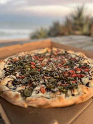 Mushroom balsamic, add spinach- jalapeños to one side   at Tony's Pizza in Flagler Beach