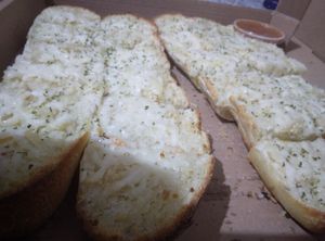 Double order of cheesy garlic bread at Tony's Pizza in Flagler Beach