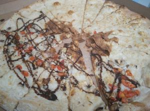 Half balsamic and half white. The center was overcooked which has not happened for previous orders. at Tony's Pizza in Flagler Beach