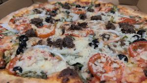 Medium happy vegan - now with vegan meatball on top at Tony's Pizza in Flagler Beach