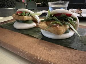 Vegan bao with tofu, chilli, coriander and a satay sauce   at Infusion Cafe & Thai in Maroochydore