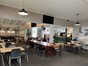 Indoor Seating Area with Bar at Mangawhai Tavern in Mangawhai